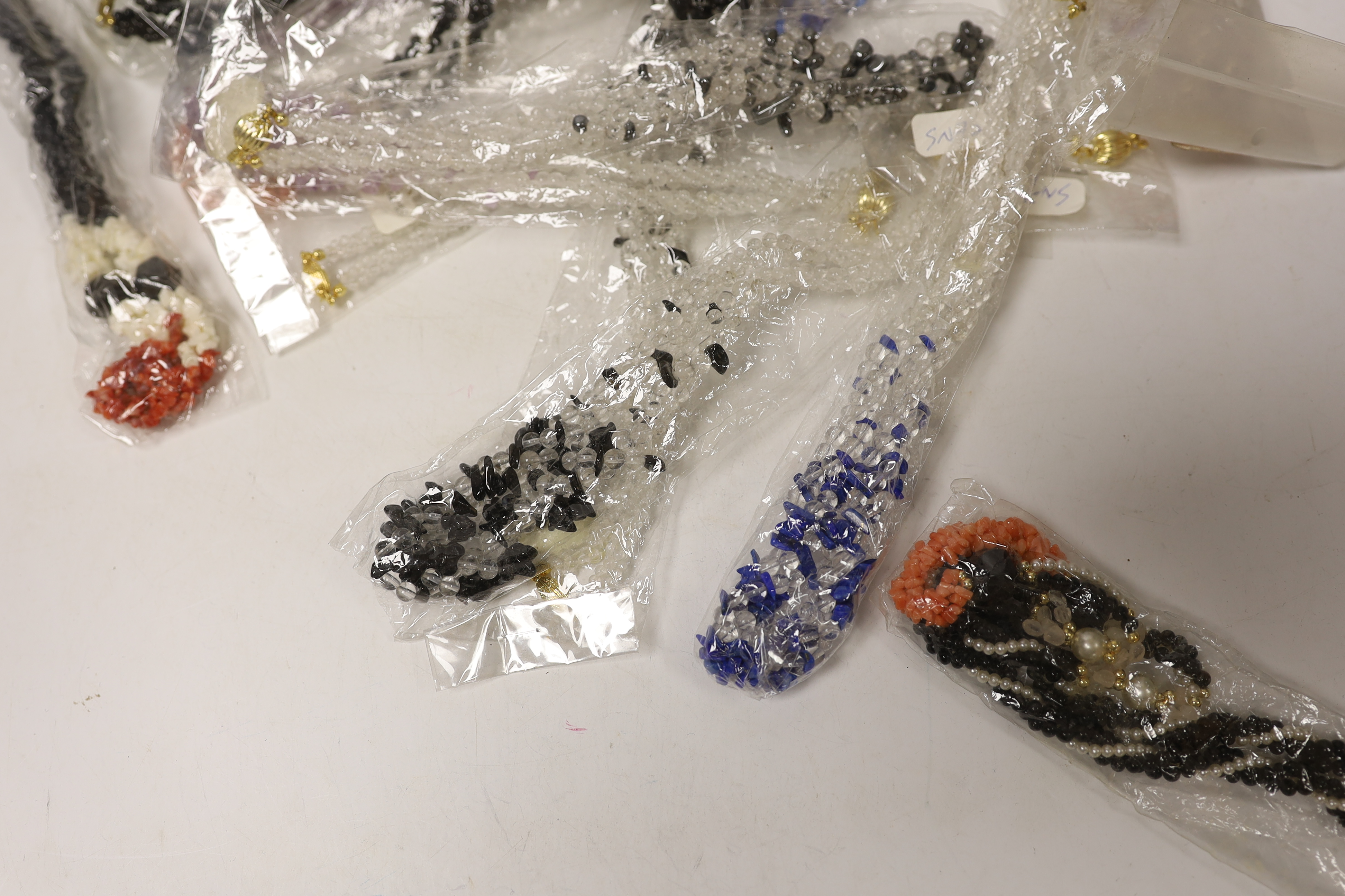 Approximately thirty assorted modern bead necklaces.